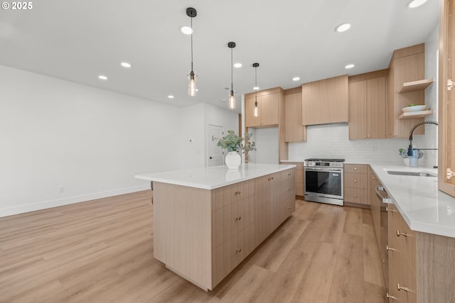 619 E Heintz St, Molalla, OR 97038 - kitchen with gas range, light brown cabinets, open shelves, light wood-style floors, and tasteful backsplash