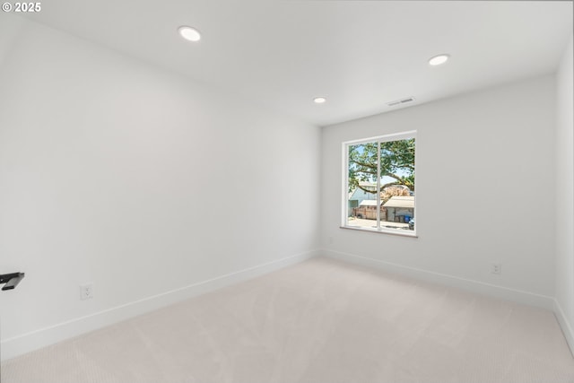 619 E Heintz St, Molalla, OR 97038 - empty room featuring light colored carpet and recessed lighting