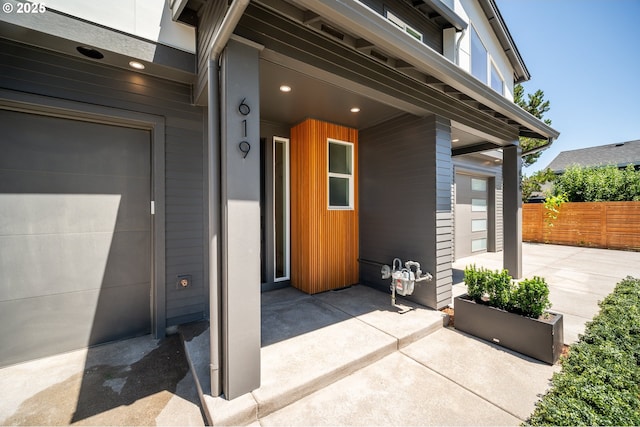 619 E Heintz St, Molalla, OR 97038 - entrance to property featuring a patio area and a garage