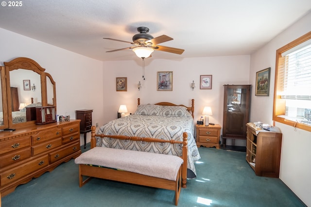 bedroom featuring ceiling fan and carpet flooring