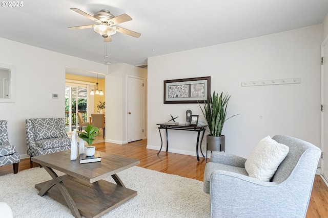1052 Shamrock Dr SE, Salem, OR 97302 - living area with light wood-style flooring and ceiling fan