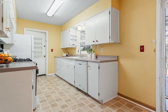 1052 Shamrock Dr SE, Salem, OR 97302 - kitchen with white appliances, white cabinets, light countertops, and light flooring