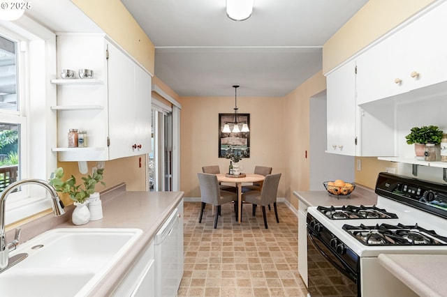 1052 Shamrock Dr SE, Salem, OR 97302 - kitchen with white appliances, white cabinetry, and light countertops