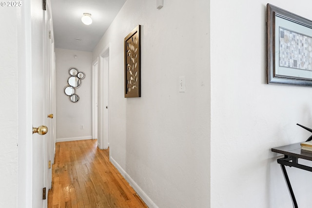 1052 Shamrock Dr SE, Salem, OR 97302 - hallway featuring light wood-style flooring and baseboards