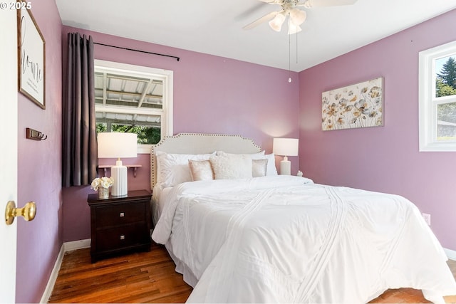 1052 Shamrock Dr SE, Salem, OR 97302 - bedroom with multiple windows, wood finished floors, and a ceiling fan