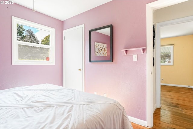 1052 Shamrock Dr SE, Salem, OR 97302 - bedroom with wood finished floors and baseboards