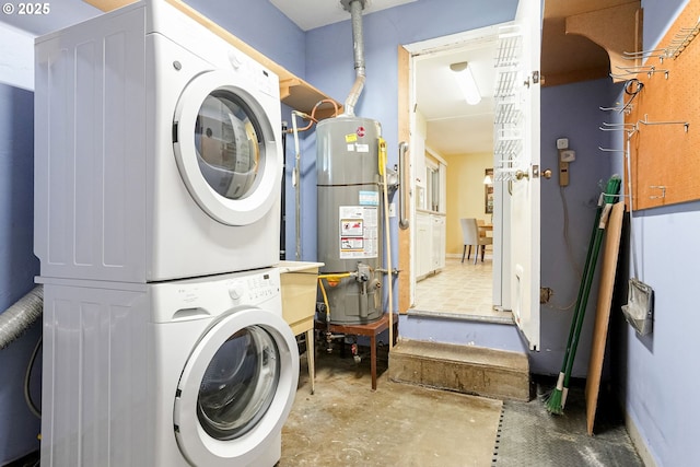 1052 Shamrock Dr SE, Salem, OR 97302 - washroom with water heater and estacked washer and dryer