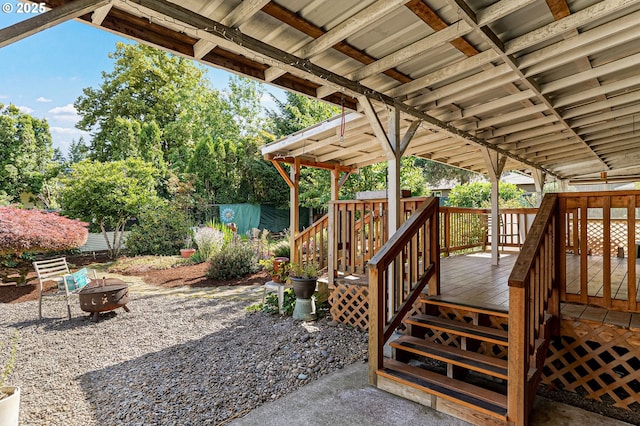 1052 Shamrock Dr SE, Salem, OR 97302 - view of patio / terrace featuring an outdoor fire pit and a wooden deck