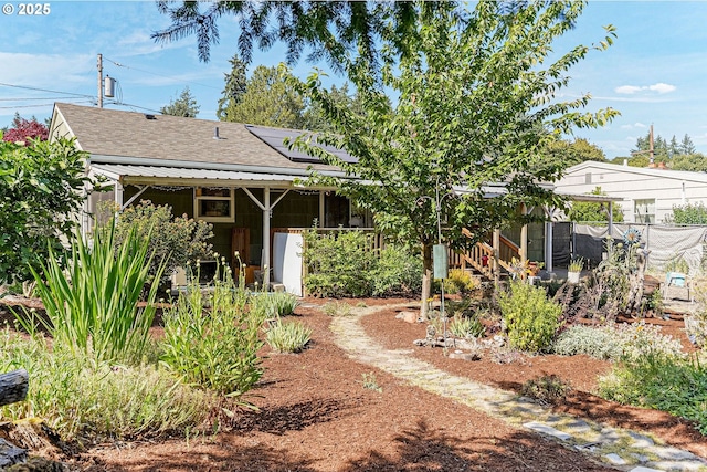 1052 Shamrock Dr SE, Salem, OR 97302 - back of house with a shingled roof and roof mounted solar panels
