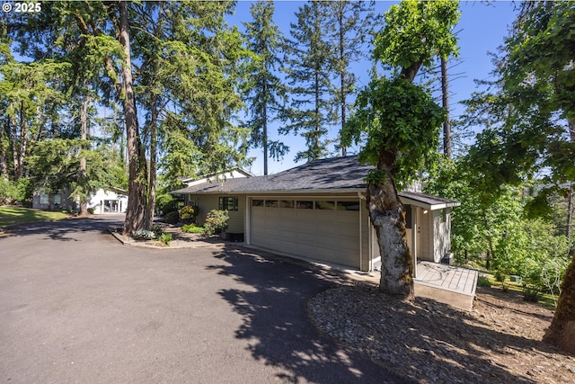 3484634844 Matthews Rd, Eugene, OR 97405 - view of front of property with an attached garage and driveway