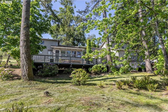 3484634844 Matthews Rd, Eugene, OR 97405 - back of property featuring a deck and a lawn
