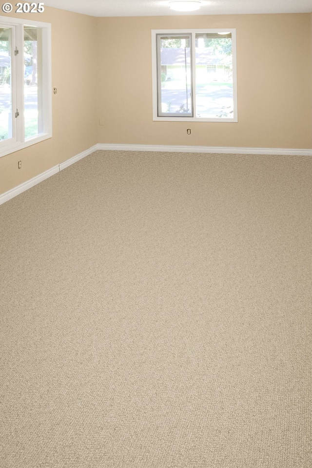 18581 Timbergrove Ct, Lake Oswego, OR 97035 - unfurnished room with a ceiling fan, dark colored carpet, and baseboards