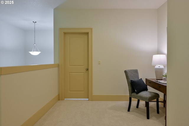 home office with baseboards and carpet