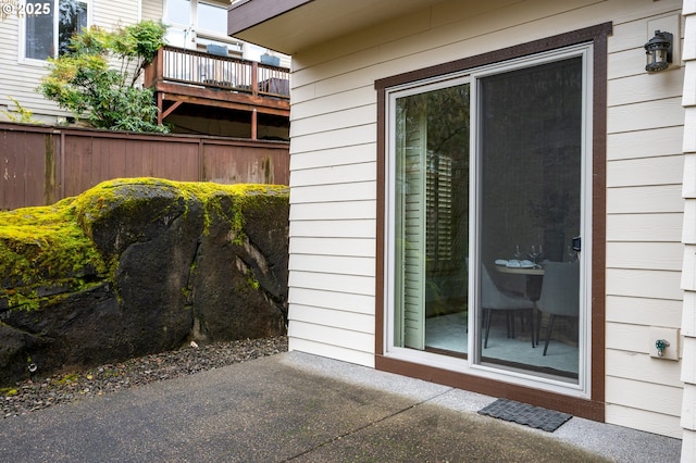 exterior space with a patio and fence