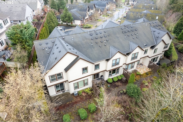 birds eye view of property with a residential view