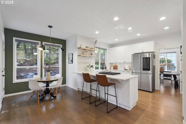 3840 NW Loy Ct, Portland, OR 97229 - kitchen with smart refrigerator, a peninsula, light countertops, white cabinets, and dark wood-style flooring