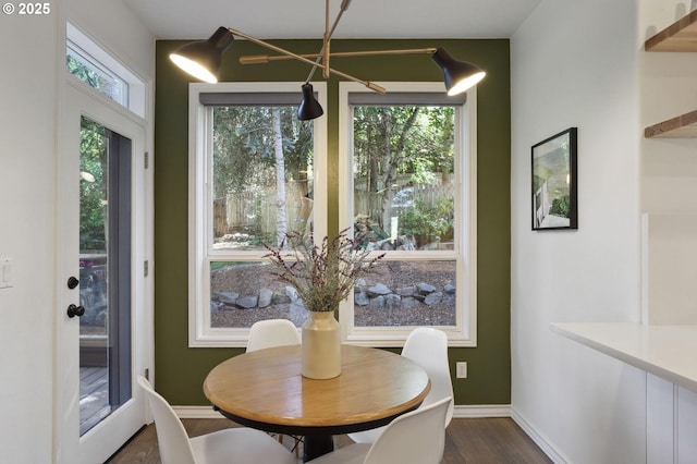 3840 NW Loy Ct, Portland, OR 97229 - dining room with dark wood-style flooring and a chandelier