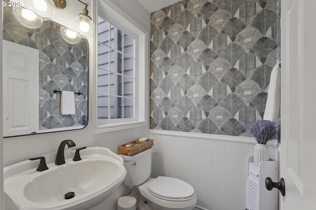 3840 NW Loy Ct, Portland, OR 97229 - half bath with a sink and a wainscoted wall