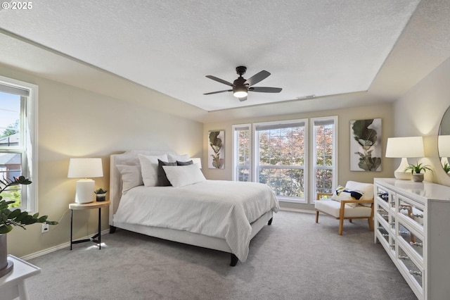 3840 NW Loy Ct, Portland, OR 97229 - carpeted bedroom featuring a textured ceiling and ceiling fan