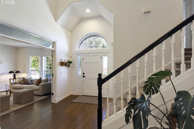 3840 NW Loy Ct, Portland, OR 97229 - foyer with plenty of natural light, dark wood-style flooring, high vaulted ceiling, stairs, and recessed lighting