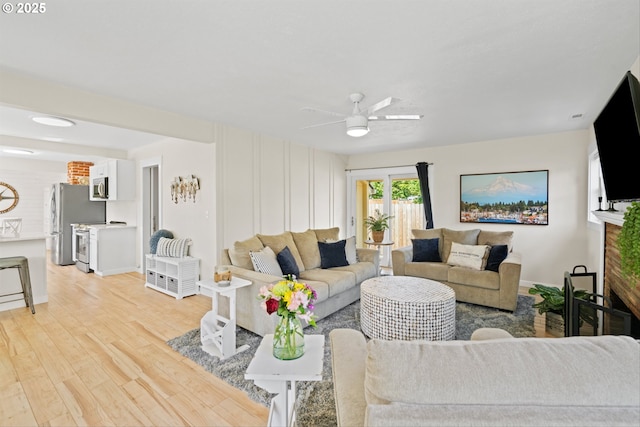 1331 NE Dallas St, Camas, WA 98607 - living room with ceiling fan and light wood-type flooring
