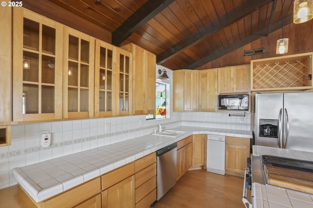 1879 N Jantzen Ave, Portland, OR 97217 - kitchen featuring stainless steel appliances, backsplash, light brown cabinets, a sink, and wood ceiling