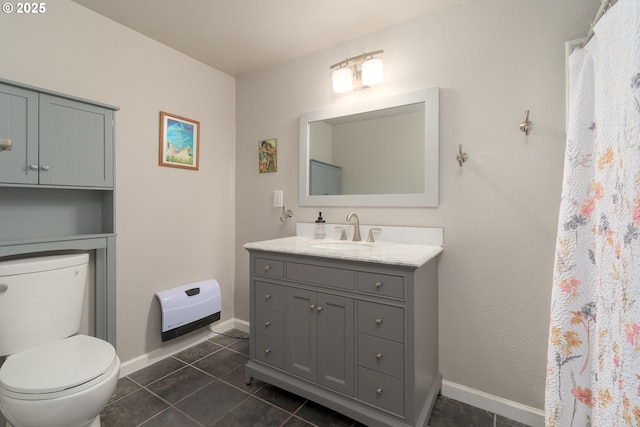 1740 Linnea Ave, Eugene, OR 97401 - bathroom with tile patterned floors, toilet, vanity, and baseboards