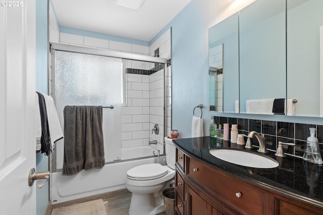 5944 SW Wilbard St, Portland, OR 97219 - full bath featuring vanity, toilet, and shower / bath combination with glass door