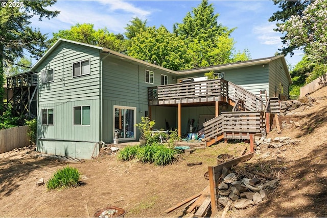 5944 SW Wilbard St, Portland, OR 97219 - rear view of property with stairway and a deck