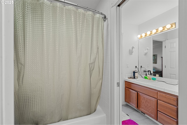 bathroom with shower / bath combination with curtain, tile patterned floors, and vanity