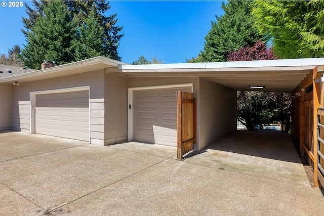 garage featuring driveway