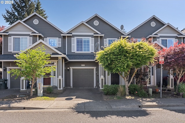 4952 SW Wentworth Ter, Beaverton, OR 97078 - view of front of house featuring an attached garage and driveway