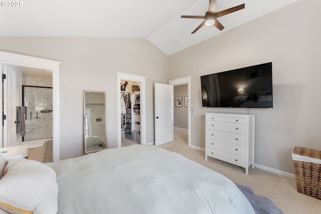 4952 SW Wentworth Ter, Beaverton, OR 97078 - bedroom with a spacious closet, lofted ceiling, light colored carpet, connected bathroom, and baseboards