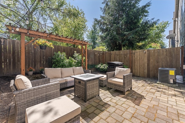 4952 SW Wentworth Ter, Beaverton, OR 97078 - view of patio with an outdoor living space, cooling unit, and a fenced backyard