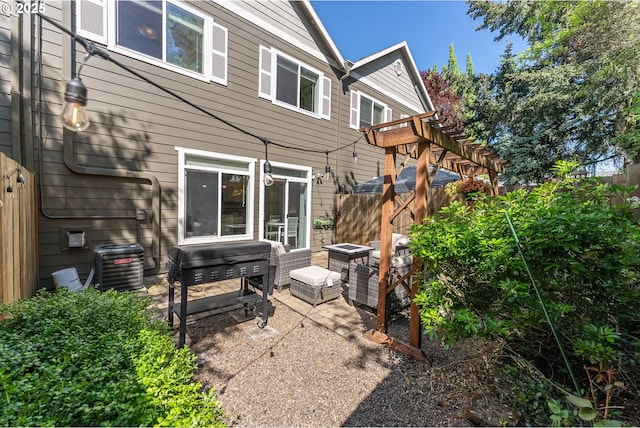 4952 SW Wentworth Ter, Beaverton, OR 97078 - view of patio / terrace with central air condition unit, fence, and a grill