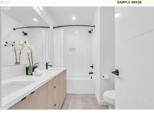 full bathroom with tile patterned flooring, vanity, shower / bathtub combination with curtain, and toilet