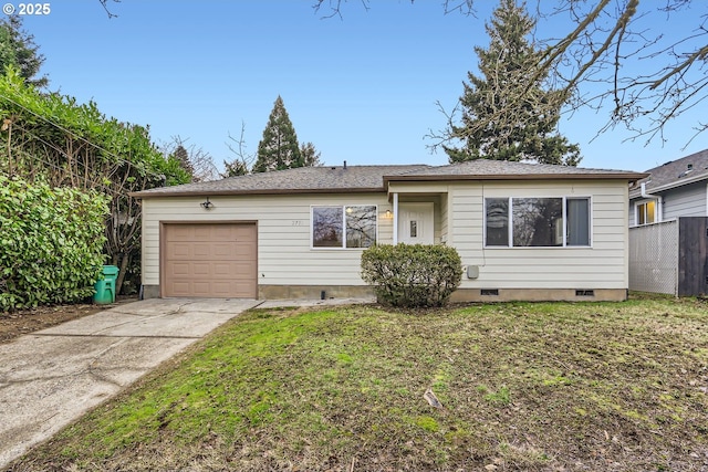 ranch-style home with a garage and a front yard