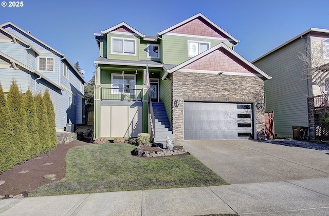 view of front facade with a garage and a front yard