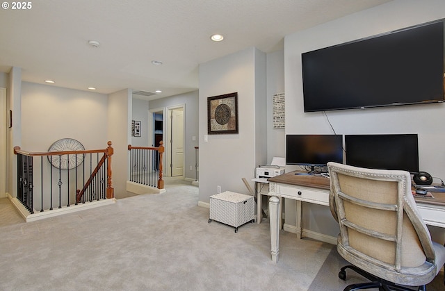 office area featuring light colored carpet