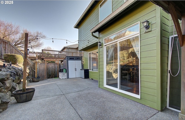 view of patio with a storage shed