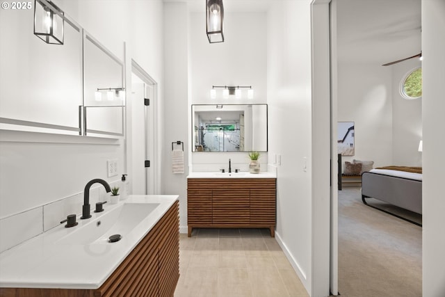 2390 Southshore Blvd, Lake Oswego, OR 97034 - ensuite bathroom with two vanities and baseboards