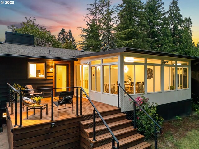 2390 Southshore Blvd, Lake Oswego, OR 97034 - back of property with a sunroom and a wooden deck