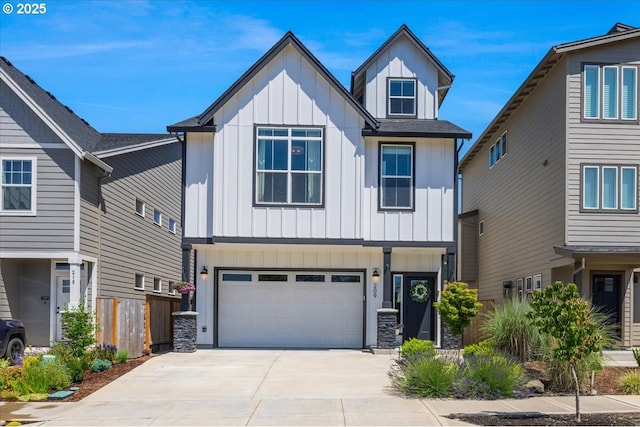 209 W Barbaras Way, Newberg, OR 97132 - view of front facade featuring board and batten siding, driveway, and an attached garage