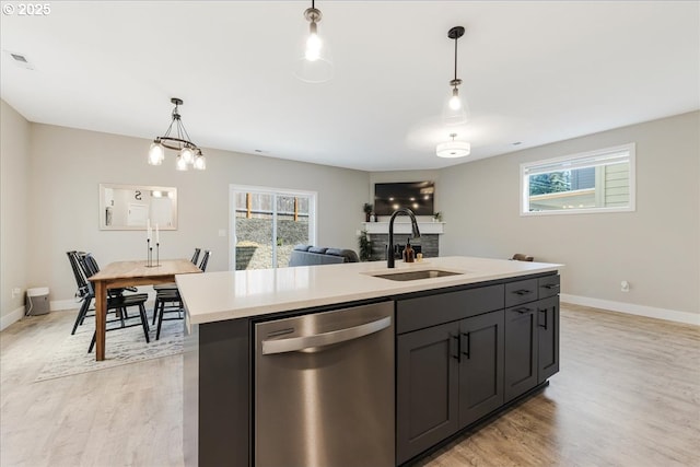 209 W Barbaras Way, Newberg, OR 97132 - kitchen featuring stainless steel dishwasher, light wood-style flooring, and healthy amount of natural light