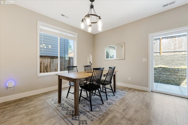 209 W Barbaras Way, Newberg, OR 97132 - dining area featuring light wood finished floors and a chandelier
