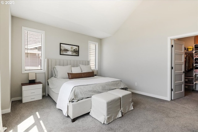 209 W Barbaras Way, Newberg, OR 97132 - bedroom featuring a spacious closet, multiple windows, carpet floors, and lofted ceiling