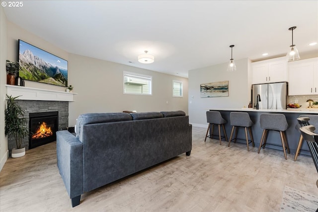 209 W Barbaras Way, Newberg, OR 97132 - living room featuring light wood-style floors, a fireplace, and recessed lighting