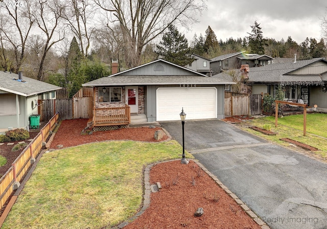 ranch-style house with a porch, a garage, and a front yard