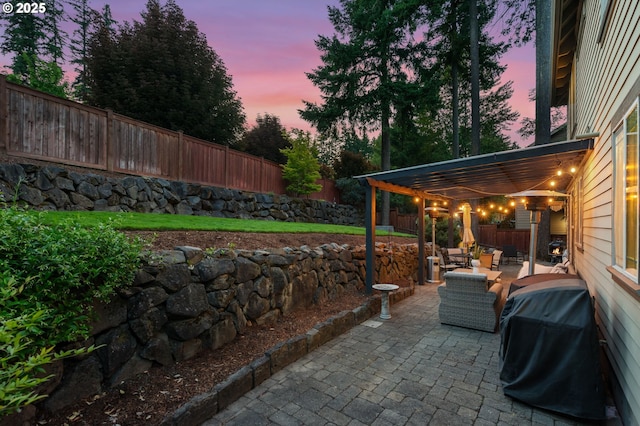 15475 SW Brighton Way, Beaverton, OR 97007 - fenced backyard with a patio and grilling area
