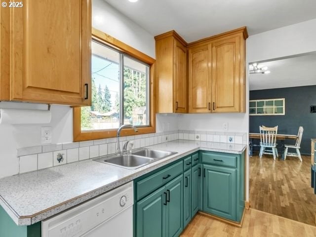 3185 14th Ave, Albany, OR 97322 - kitchen with white dishwasher, light wood finished floors, and light countertops